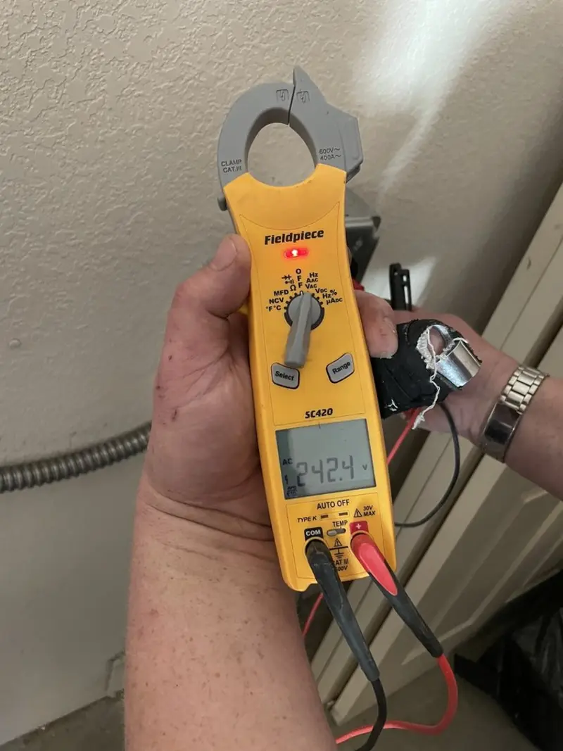 Voltage testing with clamp meter during Aluminum Wiring Replacement in Milford